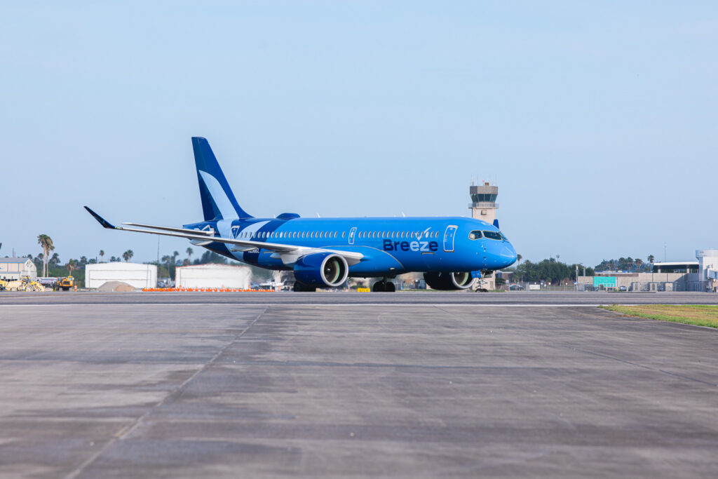 A Breeze Airways plane approaches the terminal at BRO